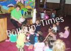 Porters Creek pastor, Rev. Adrian Knipper relays a Bible story to a group of children during VBS on Monday, June 15.