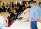Prisoners at CCA Hardeman County Correctional Facility speak with representatives from various agencies during the first annual Re-entry Resource Fair on Thursday, Feb. 4.