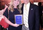 Elizabeth Breeden Sain is pictured with University of Memphis Department Chairman David Arant 
