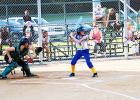 Chloe Griffin of Whiteville hits as Madison Boatwright of Bolivar catches in the first inning of their game on September 19. Bolivar beat Whiteville 13-0. 