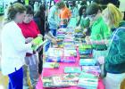 Students line up at BMS to select their own hard back book thanks to a $5,000 grant from best selling author James Patterson during the school’s Book giveaway day on Friday March 4.