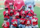 Members of The Gym and their caches proudly display their first place trophies after defeating David Dorris Logging 12-9 in the championship game of the Dizzy Dean 5-6 years old Division on Tuesday, June 9.