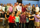 Hodge stands with the play’s cast