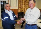 Toone Mayor Joe Jones, (right) presents a plaque to Toone Fire Chief Jack Santos is appreciation for 11 years of dedicated service to the Toone Fire Department. 