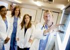 Dr. Jason Roberts (right), associate professor of animal science at the University of Tennessee at Martin, explains an x-ray to a group of students. Eighteen UT Martin students have been accepted into veterinary school programs beginning this fall, breaking the previous record of 10 students, set in 2013. 