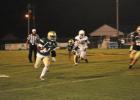 BCHS Tiger C.J. Williams runs for yardage in the game against Harding.