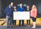 Presenting the check (l-r) are Golden Circle Bolivar Ford General Manager, Paul Mann,  Michael Cahan, Crystal Brown, Jerry Melton, Jasmine Griffin and receiving the check, Middleton High School Principal Darlene Cardwell.
