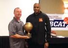 Tim Allen, left, a member of the BCAT committee presents Middleton Coach James Burkley the 2015 BCAT Single A Girls Coach of the Year Award.