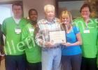 Bill Stone was honored for his military service by Caris Healthcare through the presentation of a certificate at the company’s Somerville office. Stone is a visiting volunteer for the hospice company. He is a veteran of the U.S. Army. Pictured (l-r): Shanley Gumpert, Timothy Petersen, Sharon Currie, Bill Stone, Cathy Filcek, Lisa Kee, and Gloria Mast.