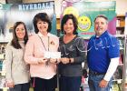 Centennial Bank made a donation to the Bolivar Middle School Library. Pictured are (left to right): Bolivar Middle School Assistant Principal Kristy Sims and Bolivar Middle School Library/Media Specialist Deana Sain along with Debbie Moore and Kenny Adkins of Centennial Bank. 