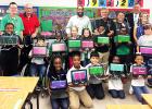 Pictured L-R  Principal James Rutherford, Buddy Nelms, Mayor Julian McTizic, Bobby Henderson,  Kenny Adkins, Warner Ross and 3rd Grade Teacher Stacy Moore and Bolivar Elementary 3rd Grade students. 