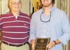 Shelton recipient of Shelby Scholarship President James Burchfield (left) presented the scholarship to Peyton (right). The scholarship is named for charter member William L. Shelby.