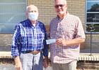Photo left to right: James Burchfield of Bolivar Civitan and Nehemiah Project Board of Directors President Johnny Weems.