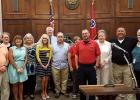 County officials gathered together to celebrate their improved financial situation since the adoption of the new budget this past summer has placed the county in a 1.3 million dollar difference against last year’s approved budget. 