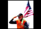 Pastor and Vietnam Veteran Walter McGill is walking from North Carolina to California on a mission. While carrying the American fl ag and saluting motorists, McGill said he is bringing awareness to the 10 Commandments, the love of Jesus, and unity among Christians.