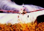 James Taylor is pictured crop dusting in 2002- 2003. Taylor spent 43 years crop dusting and was killed when his plane crashed on Wednesday, August 27.