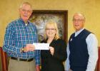 Pictured (l-r): Ken Lain, Administrator of Loaves & Fishes; Lora Moore, VP/Branch Manager of FSB; and Larry Crawford, Community Bank President of FSB.