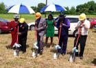 Pastor Jeffrey D. Bledsoe, his wife Bobby, State Representative Johnny Shaw, CB&S Bank representative Sharon Murden, and other church members celebrate the ground breaking of Simon Chapel MB Church new building in Whiteville