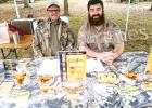 Larry Ross HFTH volunteer (left) and Matt Simcox, State Manager, recently attended the Ames Plantation Harvest Festival where they did some “grassroots” marketing and educated hunters on the Hunters for the Hungry program.          