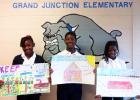 Pictured (l-r): “Keeping Grand Junction Grand” litter campaign winners from GJES, holding their posters, are Breasha Graham, Miracle Lewis and Passion Lewis.