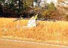 The plane, a 1967 Pitts Abernathy, was removed from the highway by Hardeman County Deputies and Hardeman County First Responders. Photo by Michael Davis. 