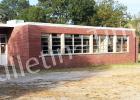 Grand Junction plans future uses for recently acquired school property The detached cafeteria building at the old Grand Junction School will soon be the new location for the city’s library. ”We’ve far outgrown our current location,” said Mayor Curtis Lane.