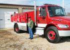 Chief John Jordan is shown standing beside the Silerton Fire Department’s new tanker truck.