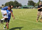 Keshawn Burkley carried his “buddy” and teammate Louis Cross during the Combat Fitness Test, as sergeant Brazil (right) looks on.