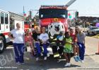 BFD holds annual Fire Prevention Festival Firepup posed with HES cheerleaders Kenley Mitchell, Gracie Swift, Chesney Cuthberth and Brianna Gooch, Michael Rivers, Jemeria Rivers, Marnina Smeltser and HES cheerleader Summer Williams.