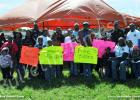 Community Day held in Whiteville Pictured front row (l-r): Chloe Williamson, Matthan Jones, Gladdaysha Wilson, Goriannah Pirtle, Tyrone Burns, Jr., Joshua Harvey, Maya Wilson, Elizabeth Burns, Leila Harvey, Morgan Wilson, Arlena Burns, Elder Emil Jenkins and Myi Pirtle. Back row (l-r): Anthony Wilson, Marla Wilson, Temisha Allen, Shunda Williamson, Drexler Allen, Robert Greer, Sharon Burns, Andrae Parham and Elder Eddie Jenkins.