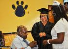 Michelle Sutton is pinned by her father, Dr. Herbert L. Sutton, MD.