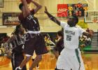 Javonte Crisp goes up for the block against Liberty Tech.